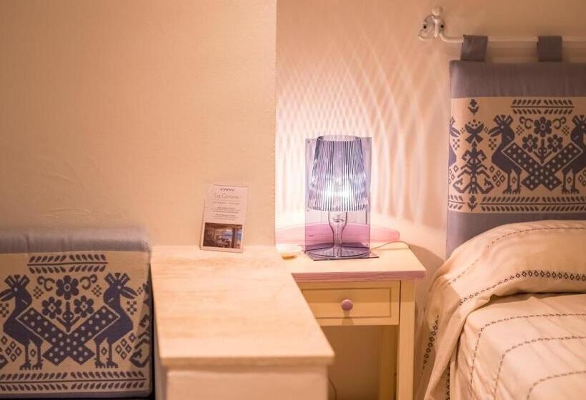 غرفة عائلية, Ollastu