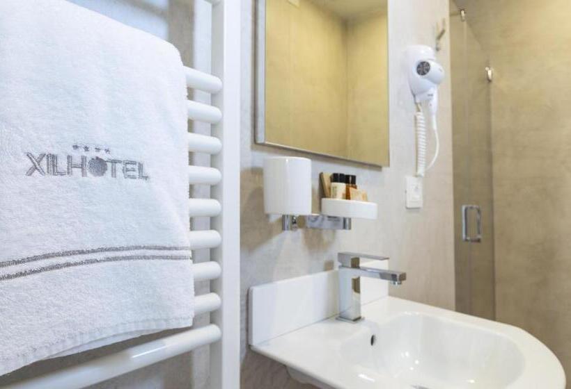 标准单人间, Xil