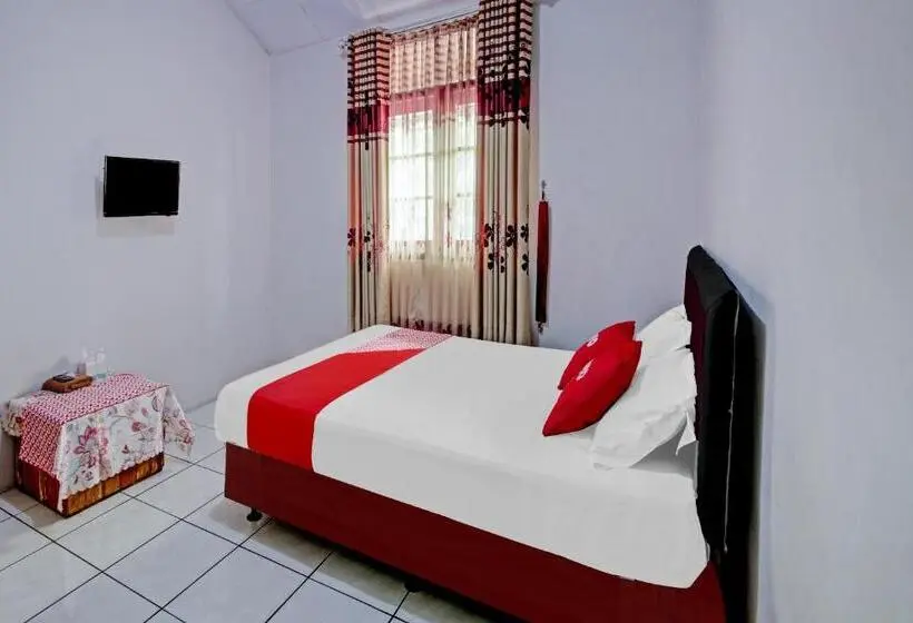 キングサイズベッドのデラックスルーム, Oyo 90543 Annur Guest House Syariah