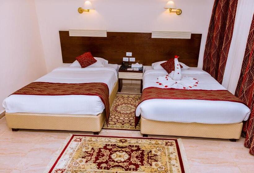 اتاق لوکس با چشم‌انداز باغ, Golden Beach Resort