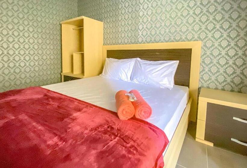 Номер Deluxe, Tini S Guest House Malang Mitra Reddoorz