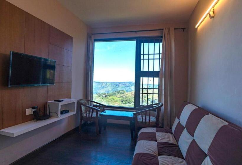 جناح مطلّ علي الجبل, Warmth Hill Crest