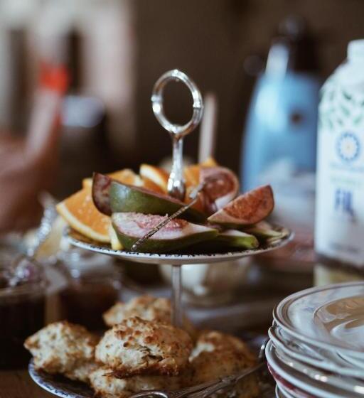 舒适三人间, Axatorpsgården