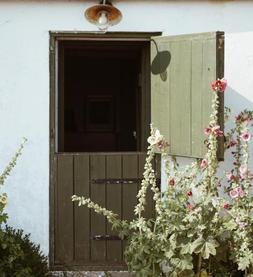 舒适三人间, Axatorpsgården