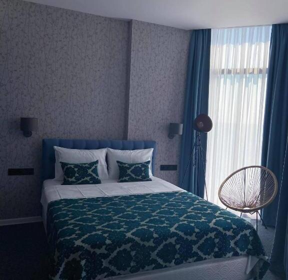 اتاق سه نفره دلوکس با چشم‌انداز دریا, Pano