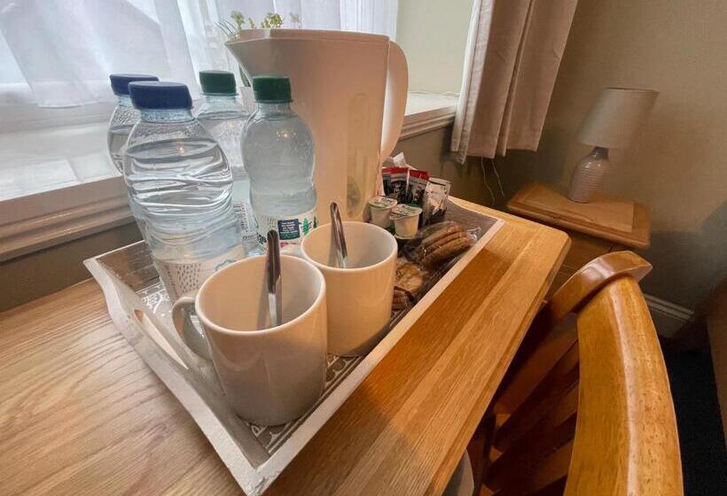 غرفة عائلية, Y Griffin