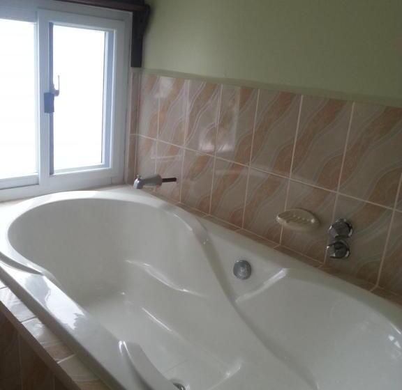 Suite Cama King, La Delphina Bed And Breakfast Bar And Grill