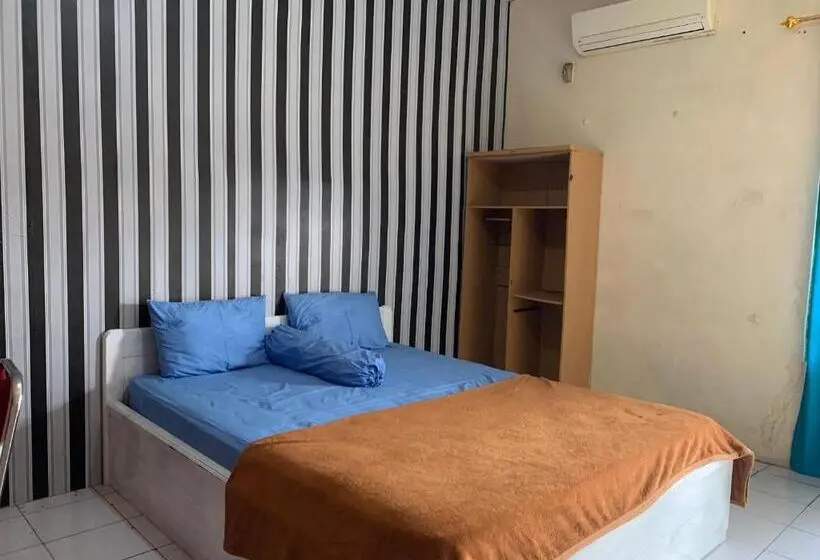 اتاق خانوادگی, Asoka Guest House