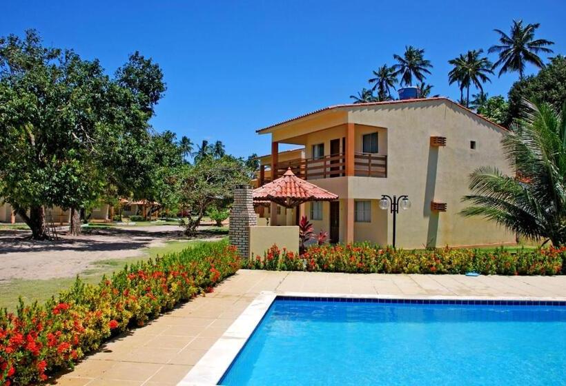 샬레, Condomínio Na Beira Mar