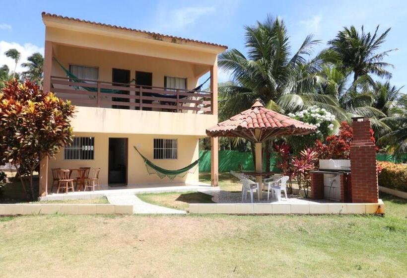 샬레, Condomínio Na Beira Mar