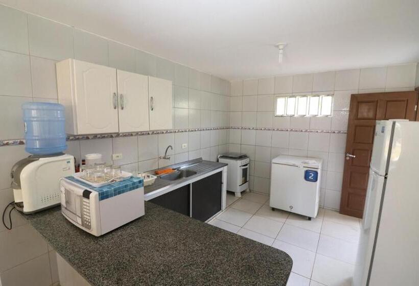 샬레, Condomínio Na Beira Mar