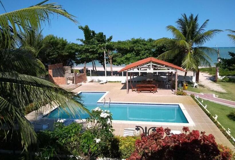 샬레, Condomínio Na Beira Mar