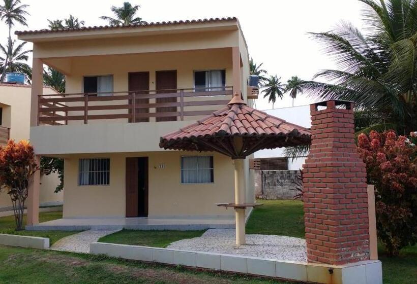 샬레, Condomínio Na Beira Mar