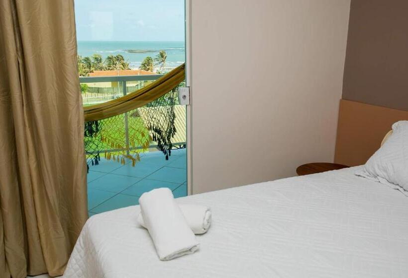 سوییت با چشم‌انداز دریا, Coqueiro Village Flats