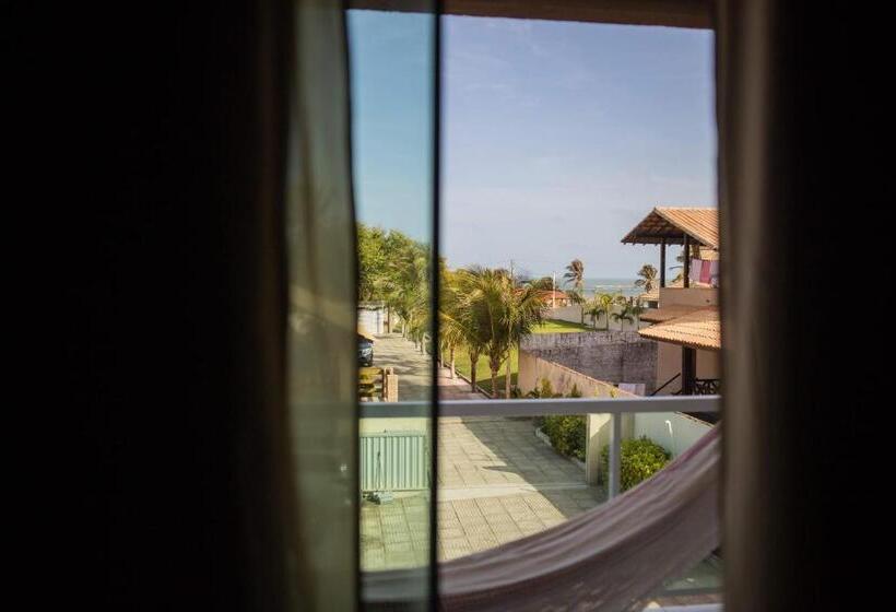 سوییت با چشم‌انداز دریا, Coqueiro Village Flats
