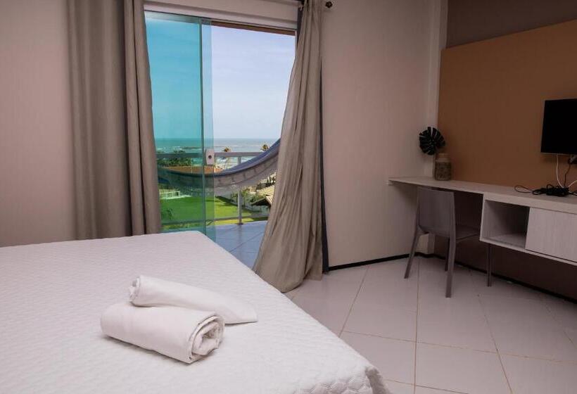 اتاق استاندارد چهار تخته با چشم‌انداز دریا, Coqueiro Village Flats