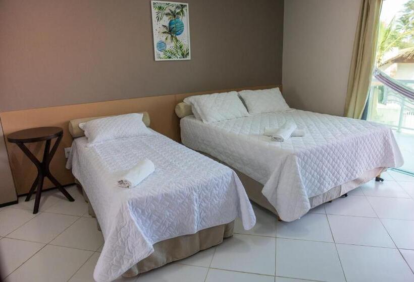 اتاق استاندارد چهار تخته با چشم‌انداز دریا, Coqueiro Village Flats