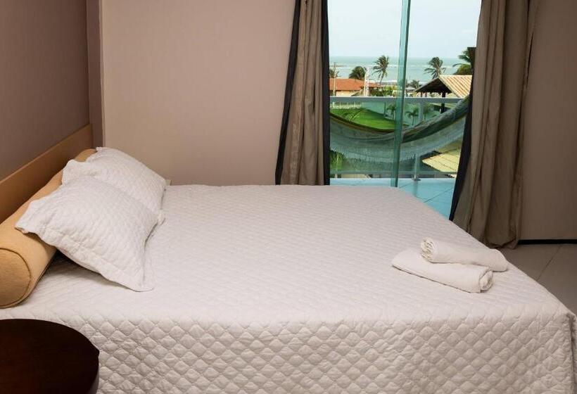 اتاق استاندارد چهار تخته با چشم‌انداز دریا, Coqueiro Village Flats
