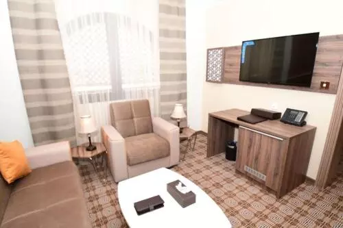 Perhesviitti, Golden Tulip Al Zahabi
