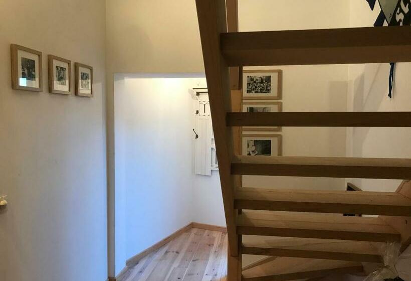 جناح عائلي, T Een En T Ander