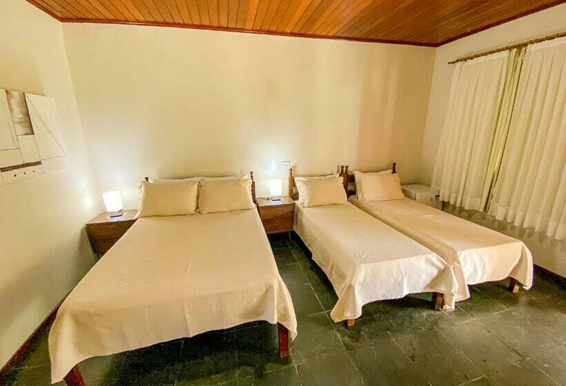 غرفة قياسية رباعية مطلة على الحديقة, Quatro Estações Pesqueiro E Hotel Fazenda