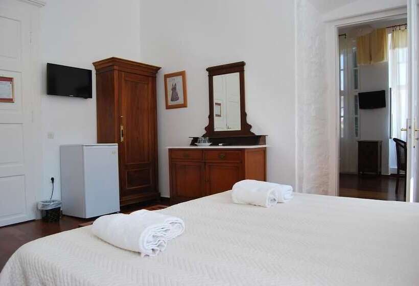 庭の見えるスタンダードトリプルルーム, Miranda