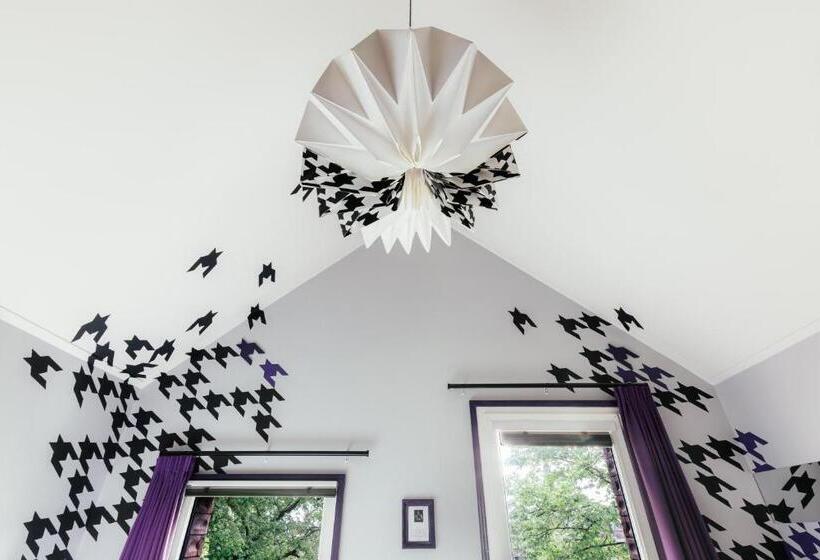 غرفة دور أخير, Design Hotel Modez