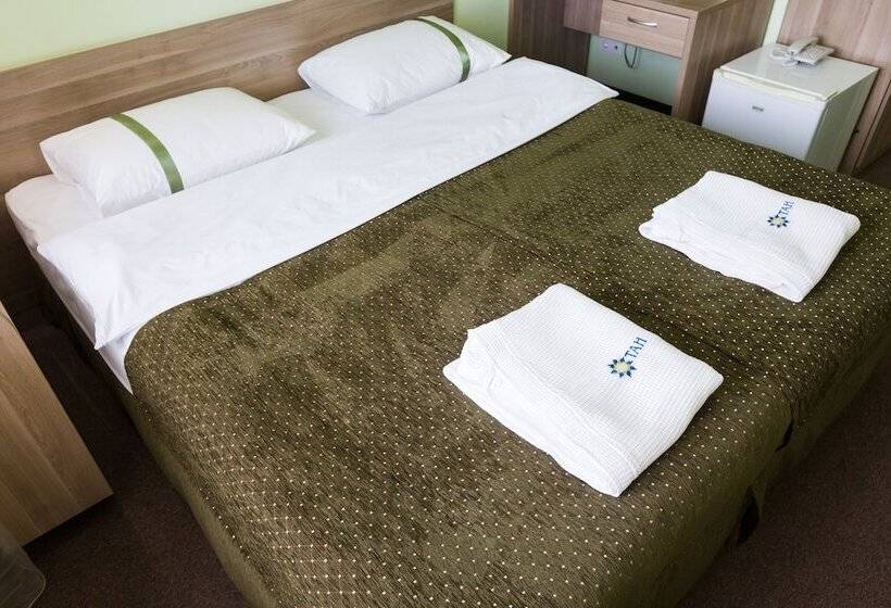 ビジネスルーム, Tan