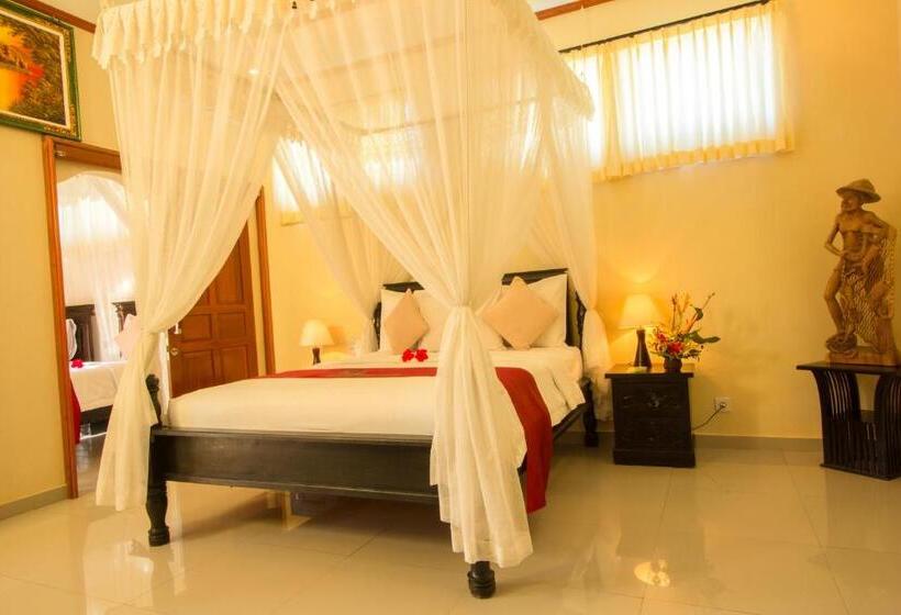 חדר משפחתי נוף לגינה, Arya Amed Beach Resort And Dive Center