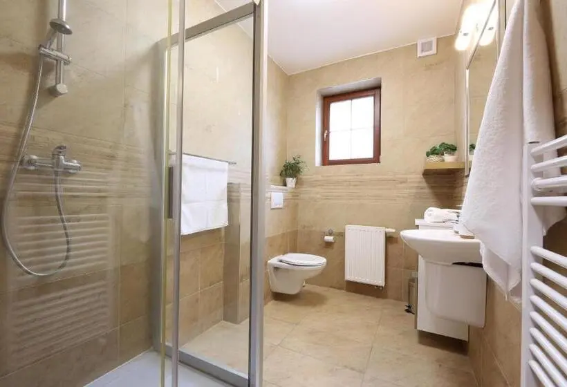 سوئیت جونیور با چشمانداز باغ, úpatí Ještědu Apartmány