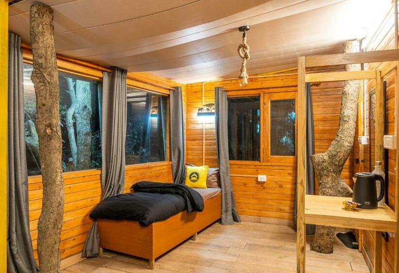 Habitació Triple Deluxe Vista Jardí, Lushtree Backpackers Hostel & Cafe