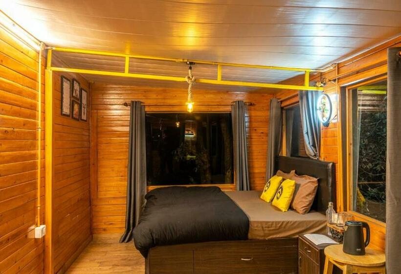 Habitació Triple Deluxe Vista Jardí, Lushtree Backpackers Hostel & Cafe