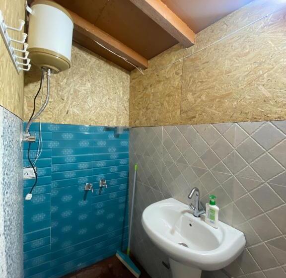 Habitació Triple Deluxe Vista Jardí, Lushtree Backpackers Hostel & Cafe