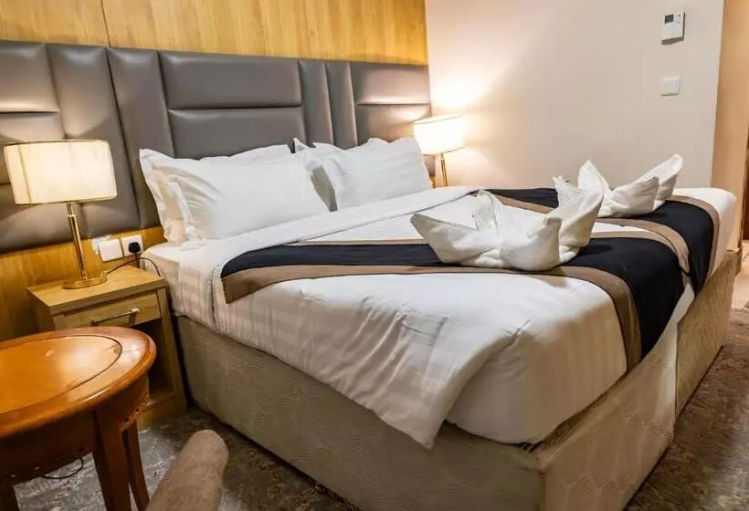 اتاق لوکس با تخت بزرگ, Zowar Alalami Hotel فندق زوار العالمي