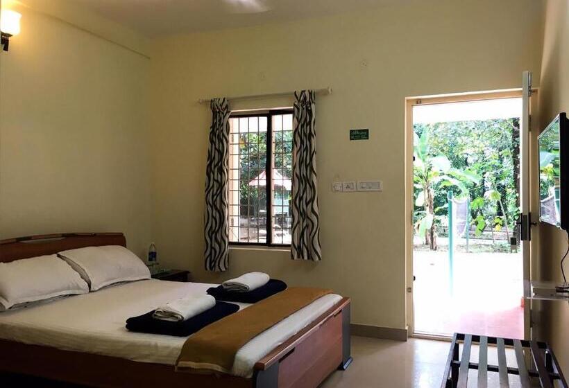Quarto Triplo Deluxe, Palmgrove Service Villa