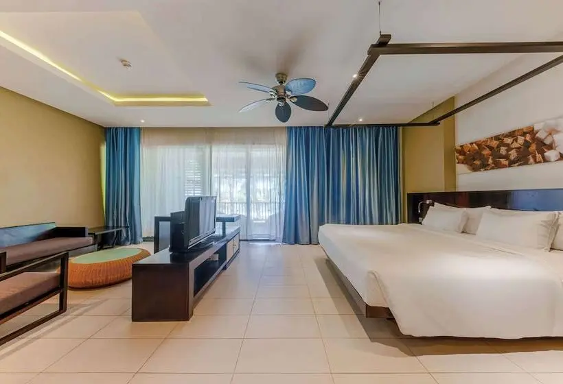سوئیت جونیور با چشم‌انداز باغ, Crystals Beach Resort Belle Mare, A Member Of Radisson Individuals