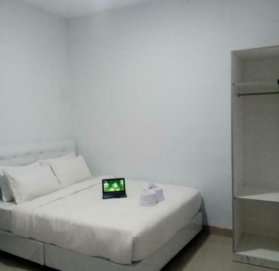 デラックスルーム, Capital O 94412 Zudo