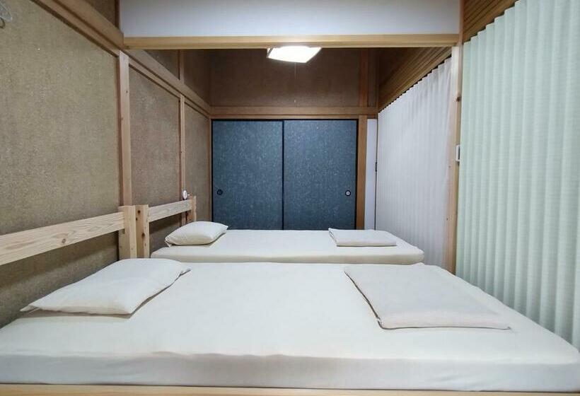 Ekonomiskt Rum, Guesthouse Tonari