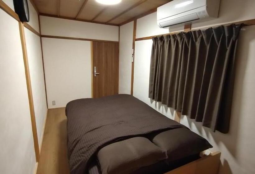 Basic Rum, Guesthouse Tonari