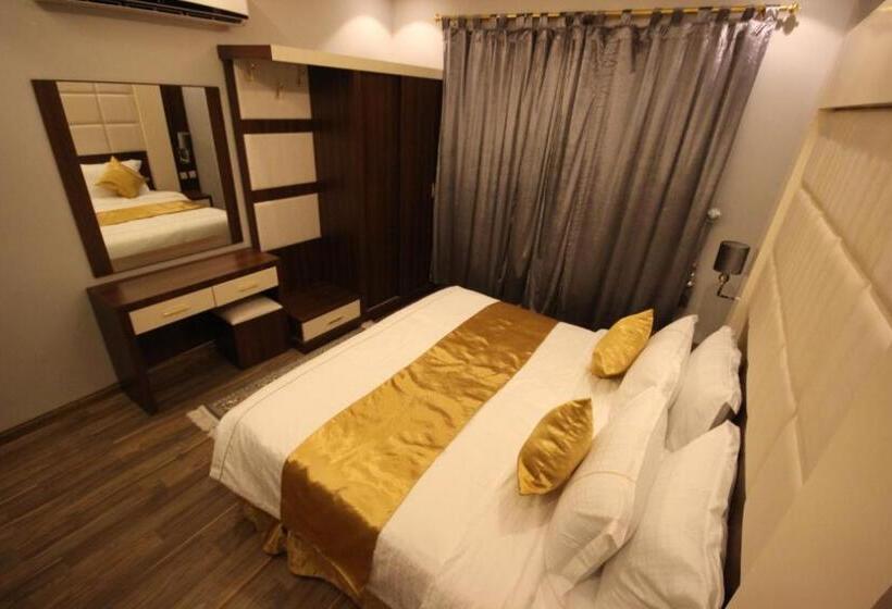 디럭스 스튜디오, Suit Los