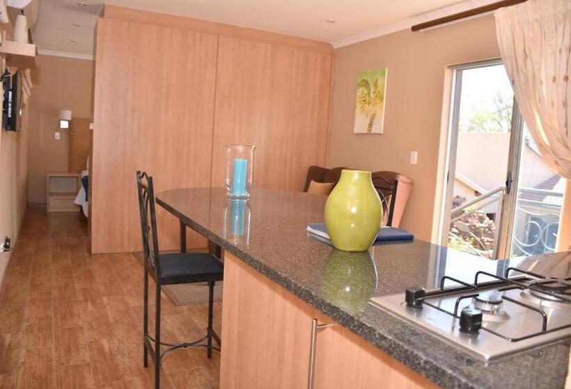 디럭스 룸 킹사이즈 침대, Homestay Travel Guest House