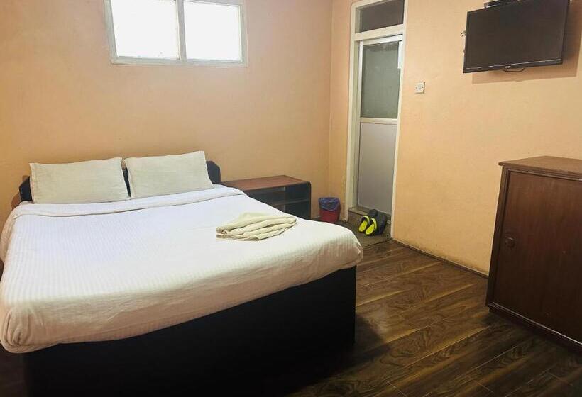 اتاق اکونومی, Travelers Home