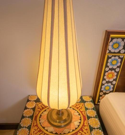 Camera Quadrupla Standard Vista Giardino, Blue Elephant Boutique