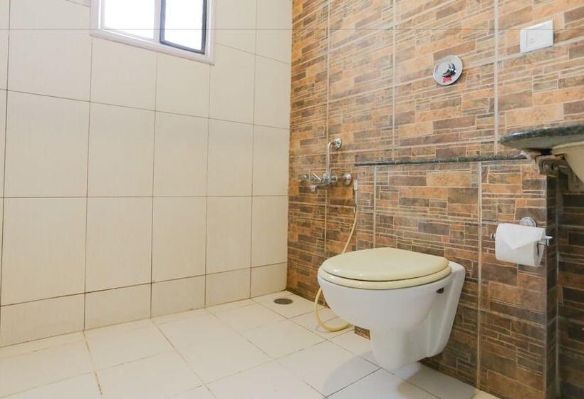 デラックスルーム, Treebo Trip Cynosure Suites