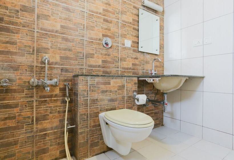 デラックスルーム, Treebo Trip Cynosure Suites