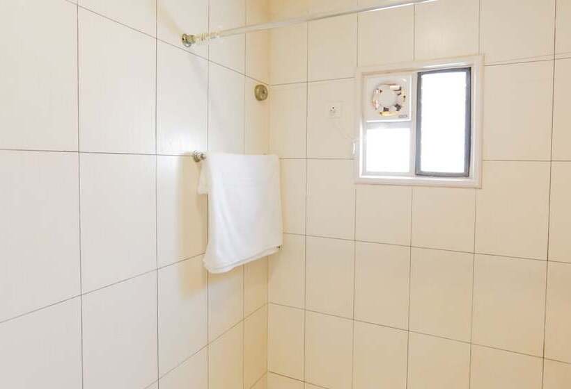 デラックスルーム, Treebo Trip Cynosure Suites