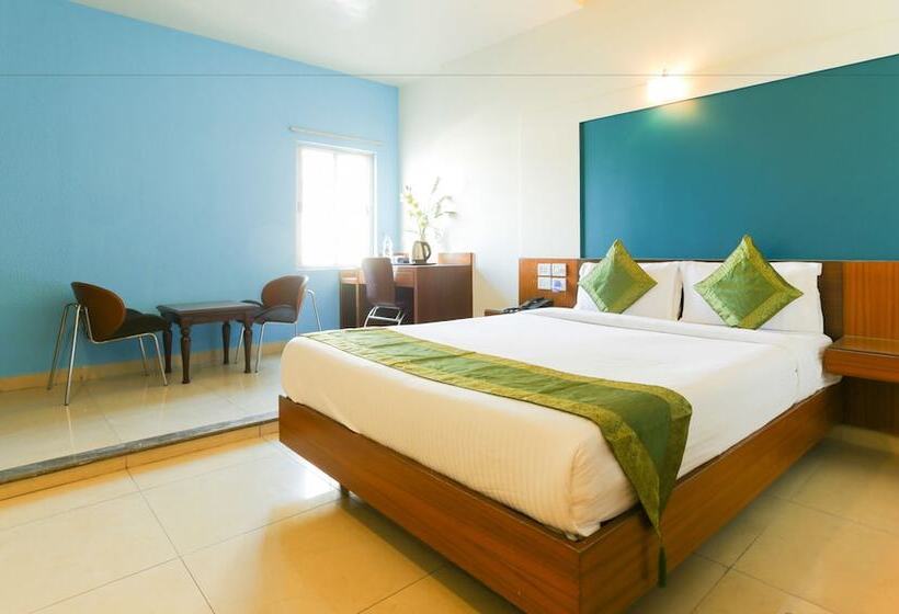 デラックスルーム, Treebo Trip Cynosure Suites