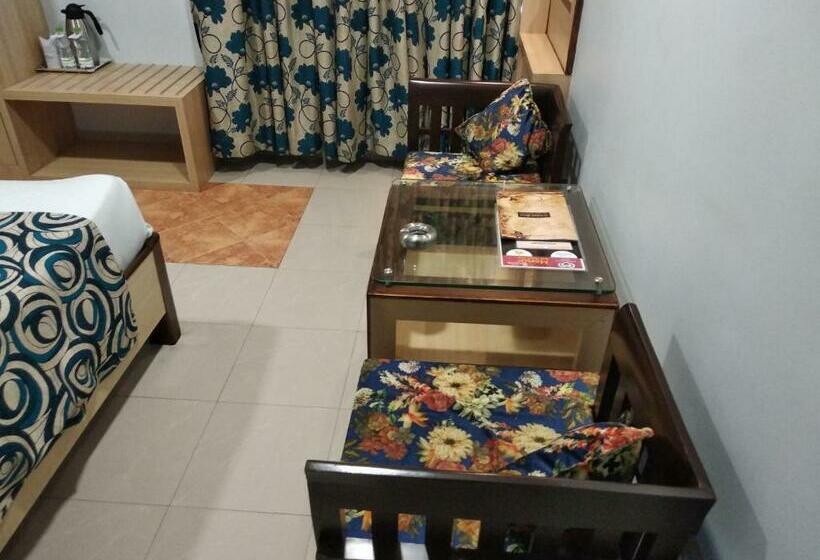 Cameră Deluxe, Pushpak