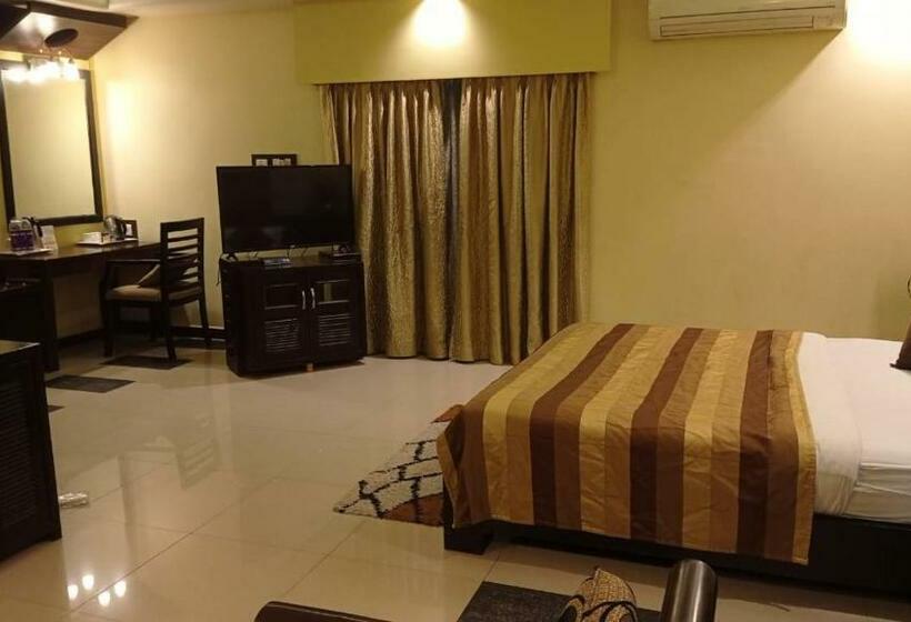 Cameră Deluxe, Pushpak