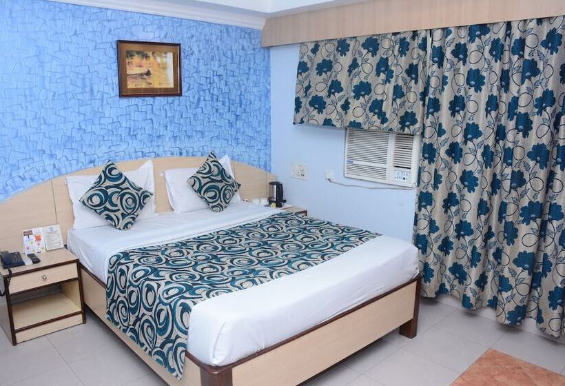 Cameră Deluxe, Pushpak